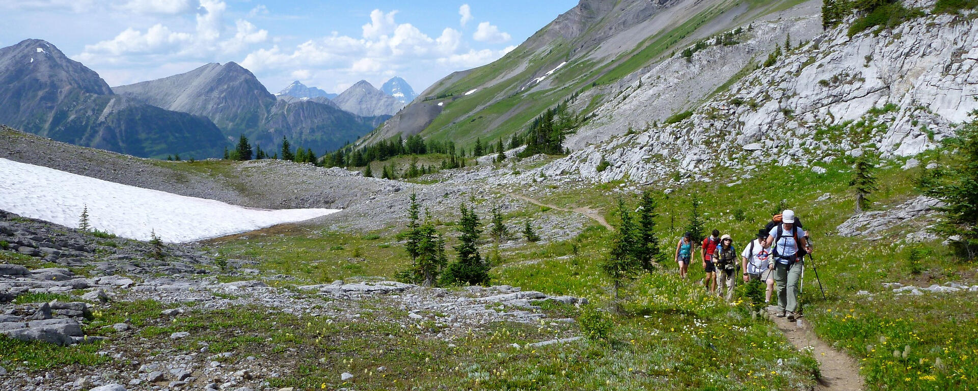 hikers on trail in pass