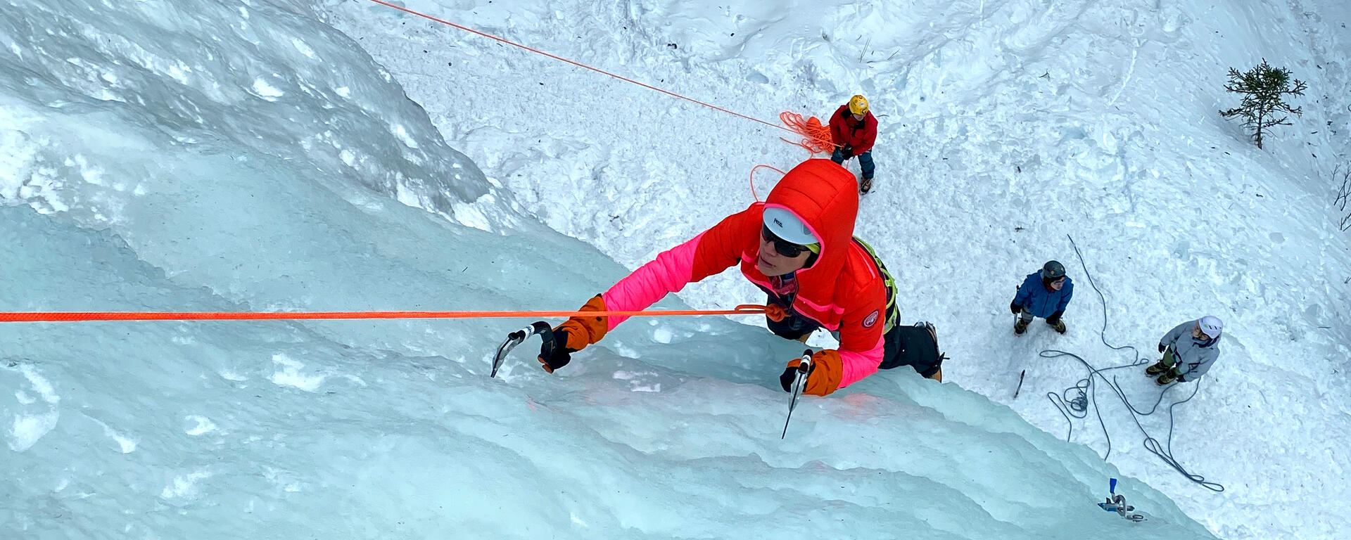 ice climber ascends