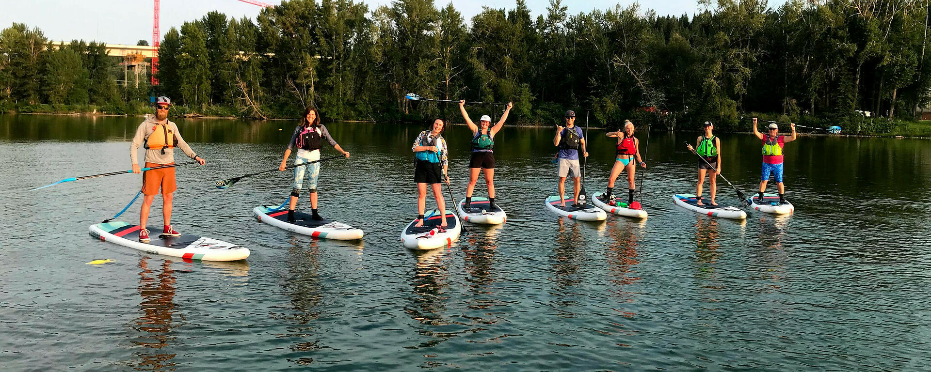 line of people on SUPs