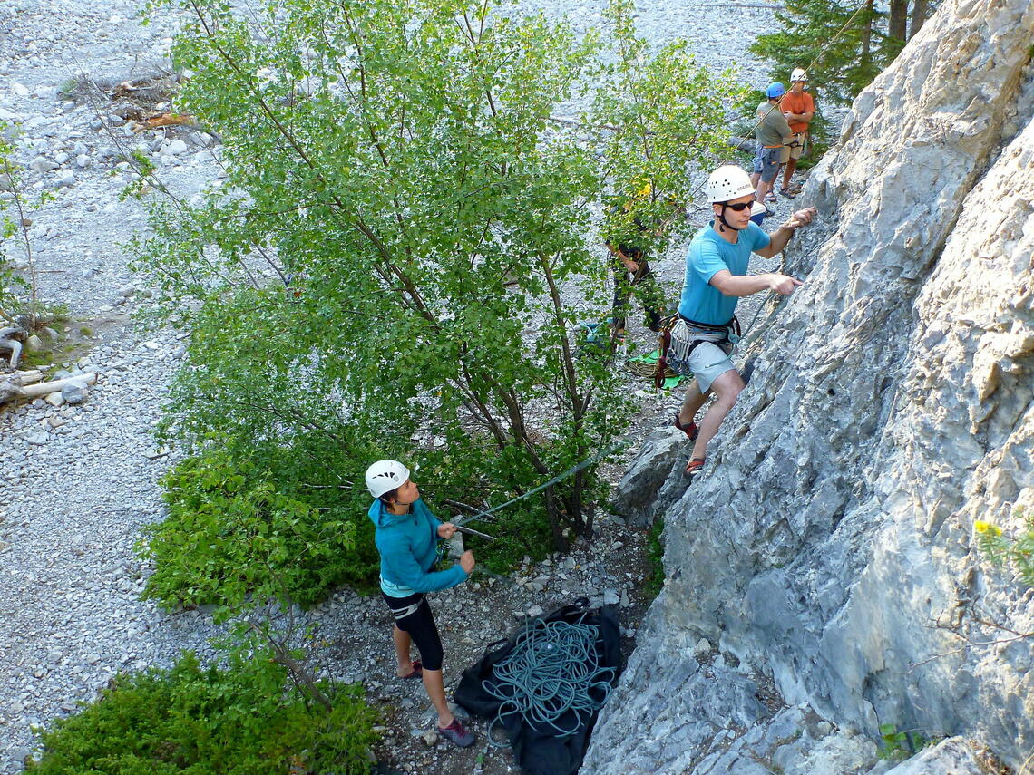 climber and belayer at crag