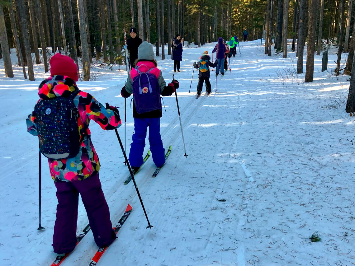 children skiing on XC trail