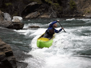solo canoe on whitewater