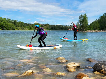 two paddlers on river